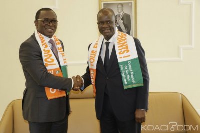 Côte d'Ivoire : A 48 heures du démarrage de la CAN, Amadou Soumahoro et des députés reçoivent leur carte et écharpe de supporters des éléphants